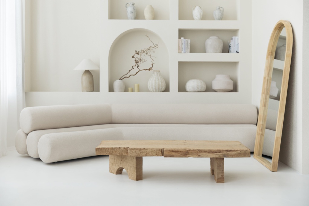 Sculptural coffee table in teak-toned solid oak